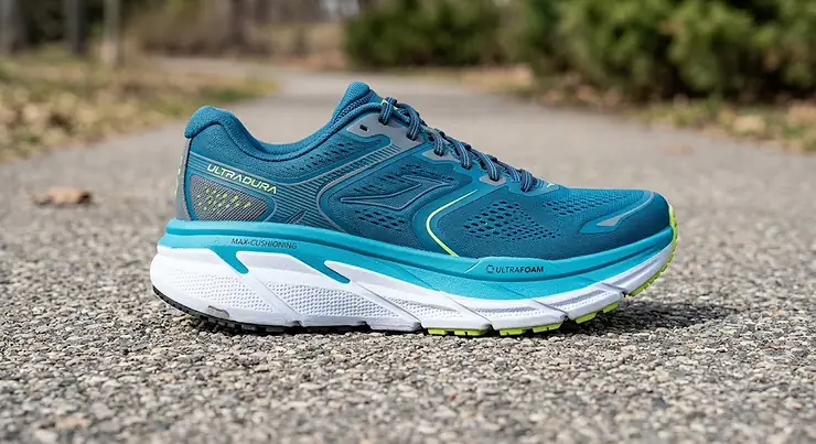 Detailed side view of a men's maximalist running shoe showcasing the thick foam midsole cushioning.